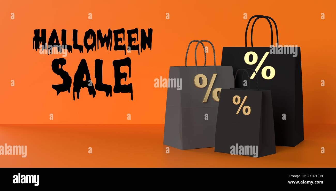 Halloween Big Sale promotion text, black paper percentage bags on orange background, copy space. Seasonal shopping card, web banner, sale, discount Stock Photo