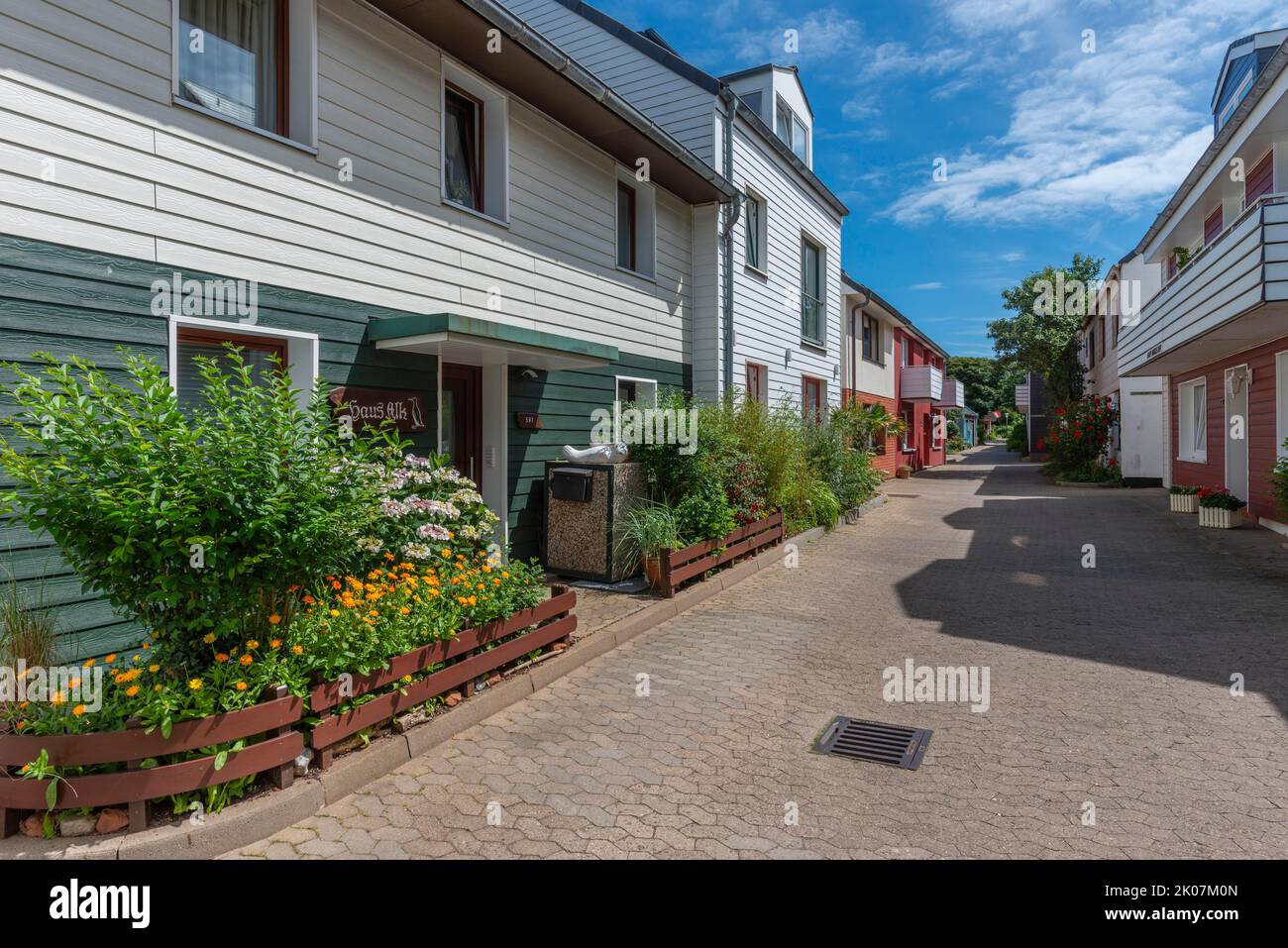 Architecture in the uplands, narrow front garden, balconies, footpath