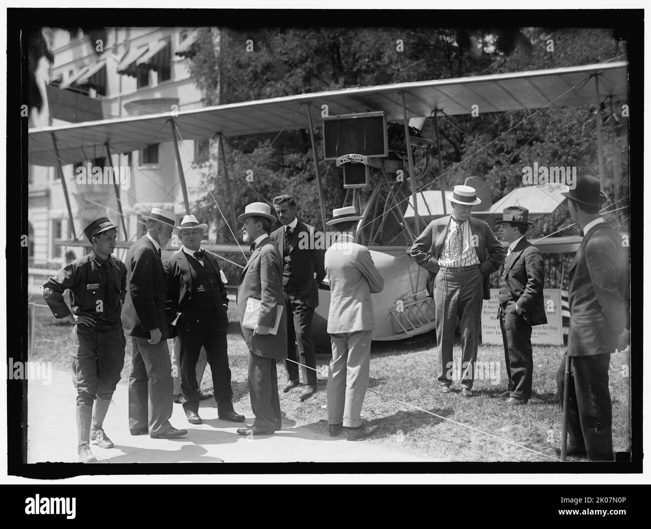 National Aero Coast Patrol Commn. Curtiss Hydroaeroplane..., between 1913 and 1917. '...Or Flying Boat Exhibited Near House Office Building. Rep. Charles Lieb; Rep. J. [Julius] Kahn; Sen. [John Worth] Kern; Capt. Taylor; Admiral [Robert] Peary; E.H. Smith'. Politicians with biplane, USA. Stock Photo