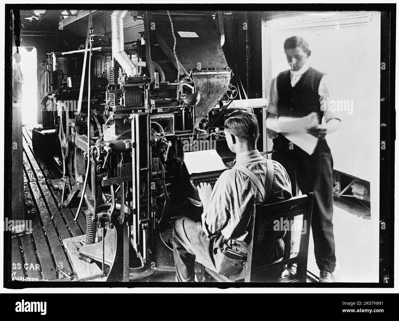 G.N. Press Car, between 1913 and 1918. Men in printing works. Stock Photo
