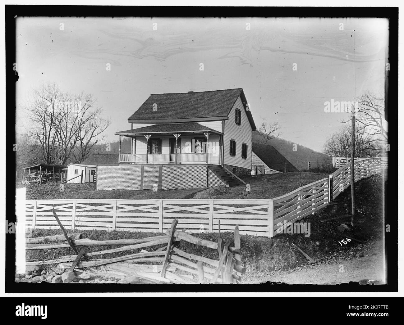 Unidentified farmhouse, between 1909 and 1923. USA. Timber house built