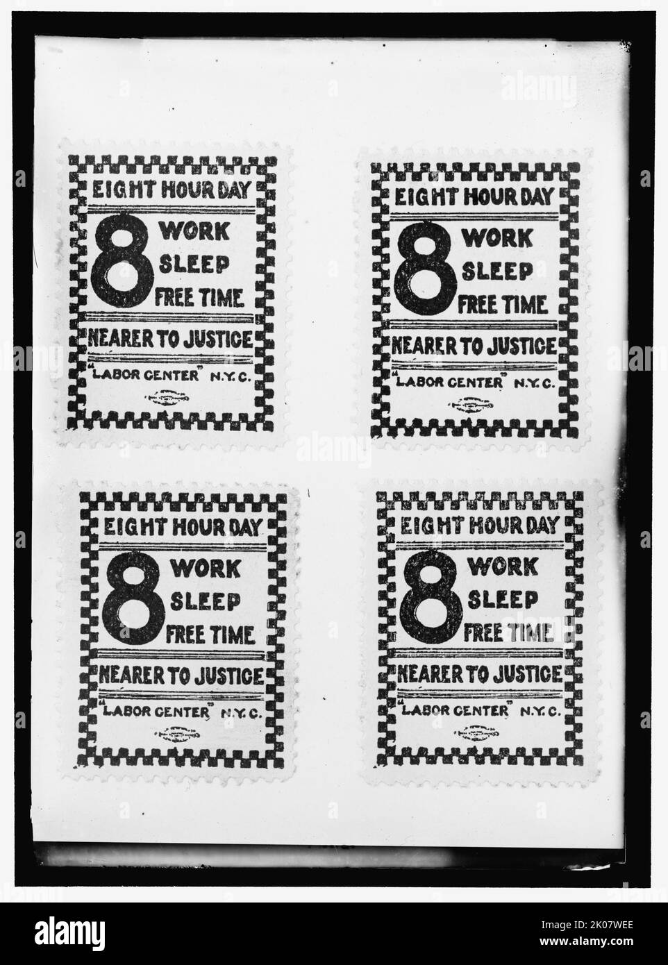 8 hour day signs, between 1910 and 1917. New York, USA. Stamps promoting realistic working hours. 'Eight Hour Day - Work; Sleep; Free Time; Nearer to Justice; &quot;Labor Center&quot; N.Y.C.' Stock Photo