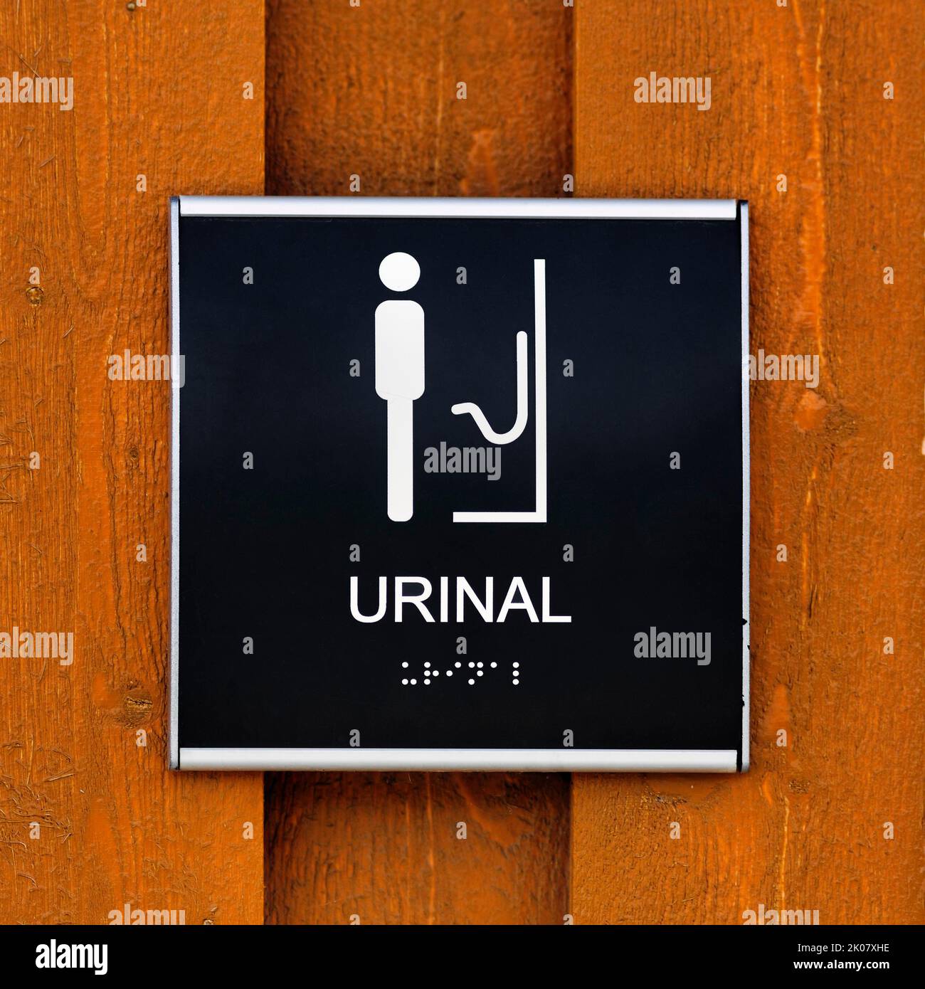 WC sign, pictogram urinal, inscription in Braille, Norway Stock Photo