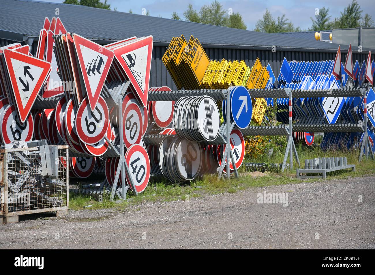 Neumunster, Germany, June 4, 2022: Traffic sings on racks on the storage area, selected focus, editorial Stock Photo