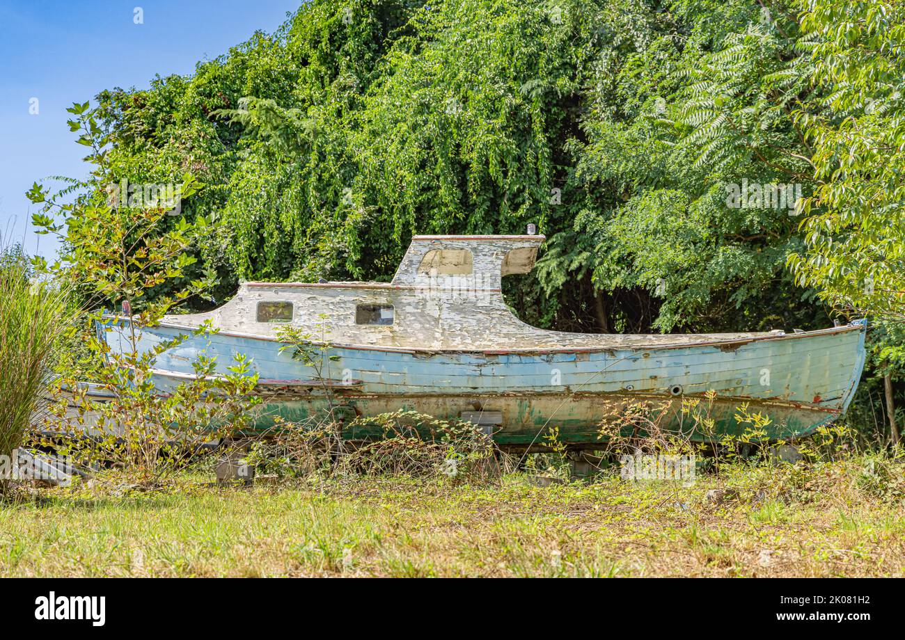 Old abandoned wooden boat Stock Photo