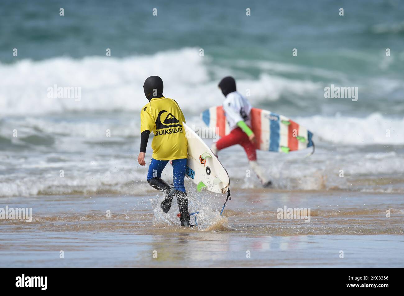 Surfers Stock Photo