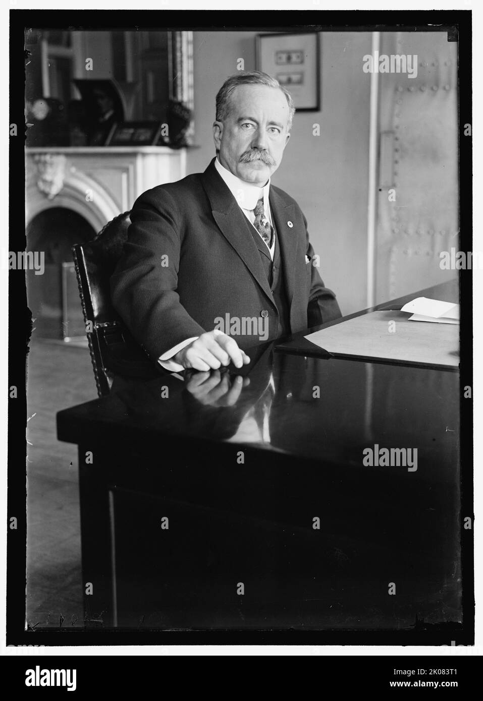 John Skelton Williams at desk, between 1913 and 1918. American financier, US Comptroller of the Currency, first president of the Seaboard Air Line Railway. Stock Photo