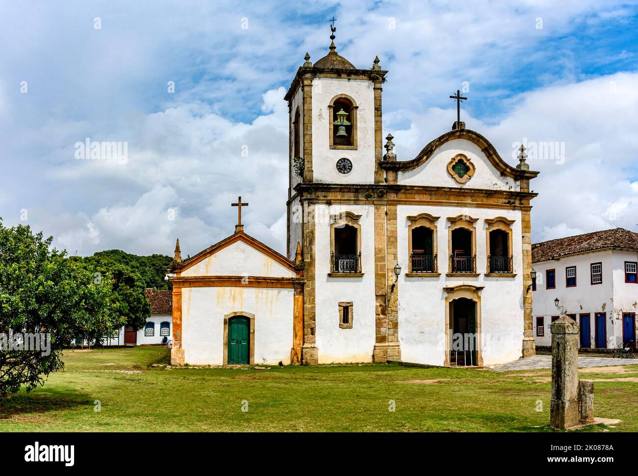 Old historic church surrounded by colonial houses in the famous and bucolic city of Paraty on the coast of Rio de Janeiro Stock Photo