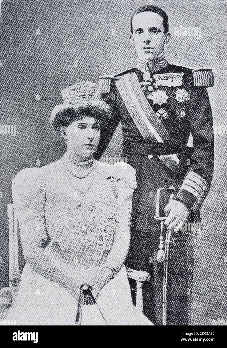 Don Alfonso XIII accompanied by Dona Victoria Eugenie Julia Ena of Battenberg. King of Spain Alfonso XIII (17 May 1886 - 28 February 1941), also known as El Africano or the African, was King of Spain from 17 May 1886 to 14 April 1931, when the Second Spanish Republic was proclaimed. Dona Victoria Eugenie Julia Ena of Battenberg (24 October 1887 - 15 April 1969) was Queen of Spain as the wife of King Alfonso XIII from their marriage on 31 May 1906 until 14 April 1931, when the Spanish Second Republic was proclaimed Stock Photo