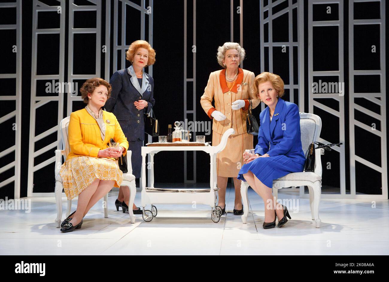 l-r: Lucy Robinson (Liz - Younger Queen), Stella Gonet (T - Older Thatcher), Marion Bailey (Q - Older Queen), Fenella Woolgar (Mags - Younger Thatcher) in HANDBAGGED by Moira Buffini at the Vaudeville Theatre, London WC2   10/04/2014   a Tricycle Theatre, London NW6 2013 production  design: Richard Kent  lighting: Oliver Fenwick  director: Indhu Rubasingham Stock Photo