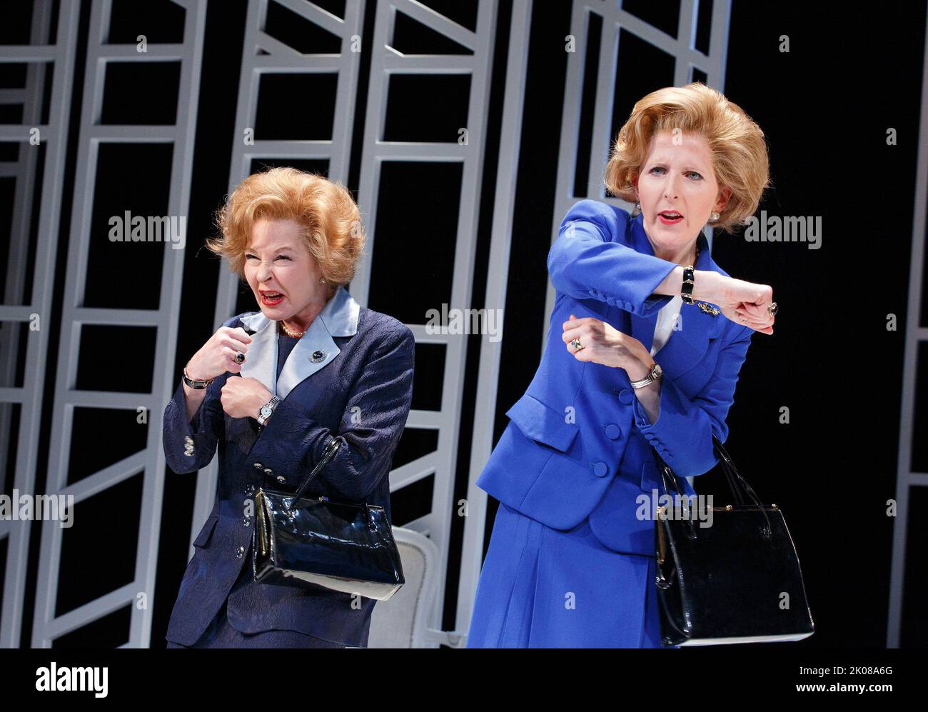 l-r: Stella Gonet (T - Older Thatcher), Fenella Woolgar (Mags - Younger Thatcher) in HANDBAGGED by Moira Buffini at the Vaudeville Theatre, London WC2   10/04/2014   a Tricycle Theatre, London NW6 2013 production  design: Richard Kent  lighting: Oliver Fenwick  director: Indhu Rubasingham Stock Photo