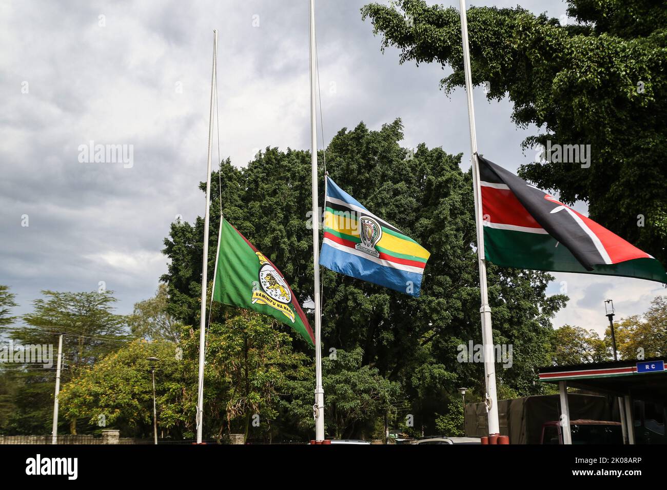 Nakuru, Kenya. 10th Sep, 2022. The flag of Kenya (R), East African Community flag (C) and that of the Kenya Administration Police fly half-mast at The Office of The President, Rift Valley Regional Headquarters in Nakuru as Kenya Mourns Her Majesty, Queen Elizabeth II. The outgoing Kenyan president, Uhuru Kenyatta, on September 9, 2022, ordered flags at half-mast in honor of the life of the Late Queen. The flags will remain half-mast until sunset Monday, September 12, 2022. Credit: SOPA Images Limited/Alamy Live News Stock Photo