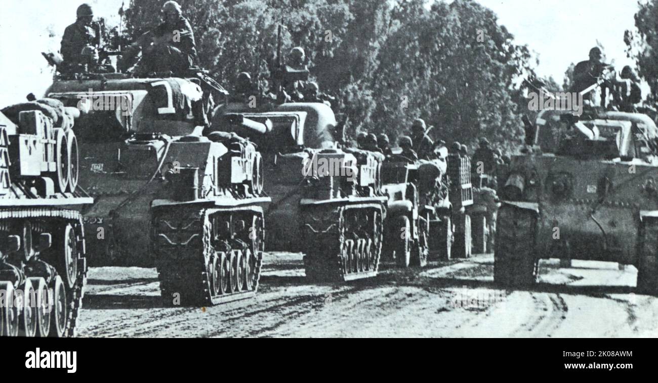 A tank unit of the Israeli defence forces prepares to continue its advance during the 1948 (or First) Arab-Israeli War, the second and final stage of the 1947-1949 Palestine War. It formally began following the end of the British Mandate for Palestine at midnight on 14 May 1948; the Israeli Declaration of Independence had been issued earlier that day, and a military coalition of Arab states entered the territory of British Palestine in the morning of 15 May Stock Photo