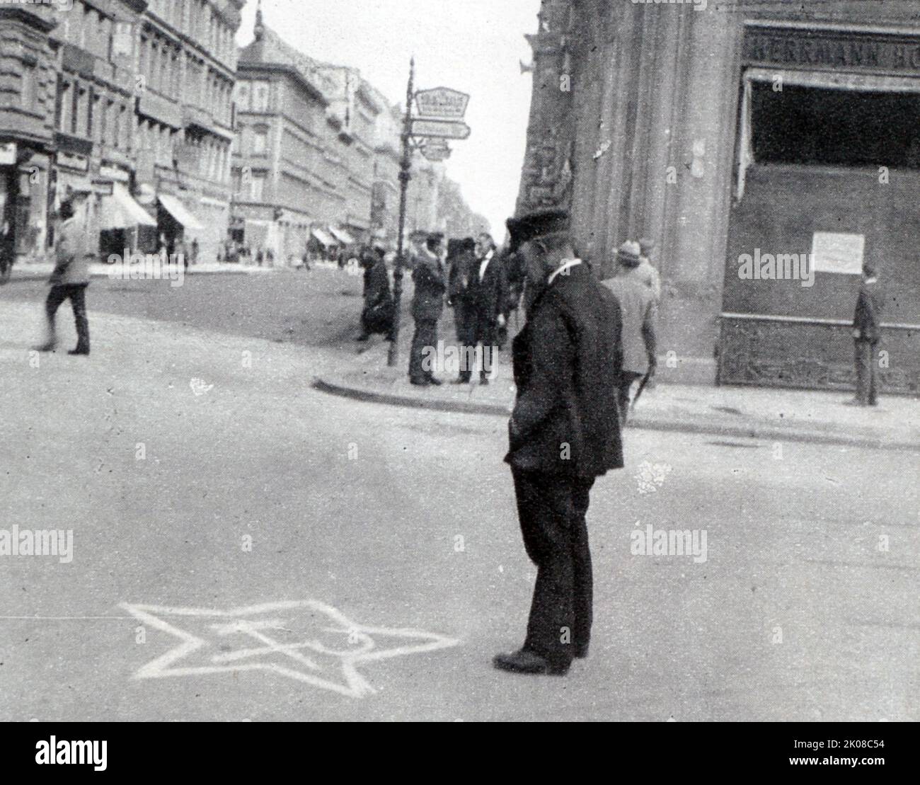 Painted by Communists on a famous broadway in Berlin during the night: The symbol of the Soviet, Hammer and Sickle, in the Friedrichstrasse Stock Photo