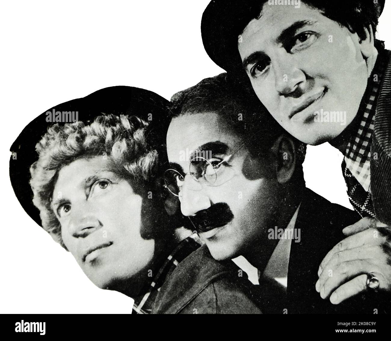 The three famous Marx Brothers were an American family comedy act that was successful in vaudeville, on Broadway, and in motion pictures from 1905 to 1949. The brothers are almost universally known by their stage names and are pictured left to right: Harpo, Groucho, and Chico Stock Photo