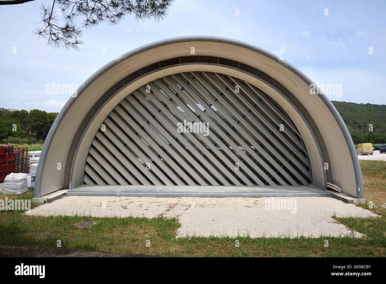 Semi-circular or cylindrical steel Wine Cellars or Winery designed by Jean Nouvel in 2008 at Domaine La Coste or Chateau La Coste Provence France Stock Photo