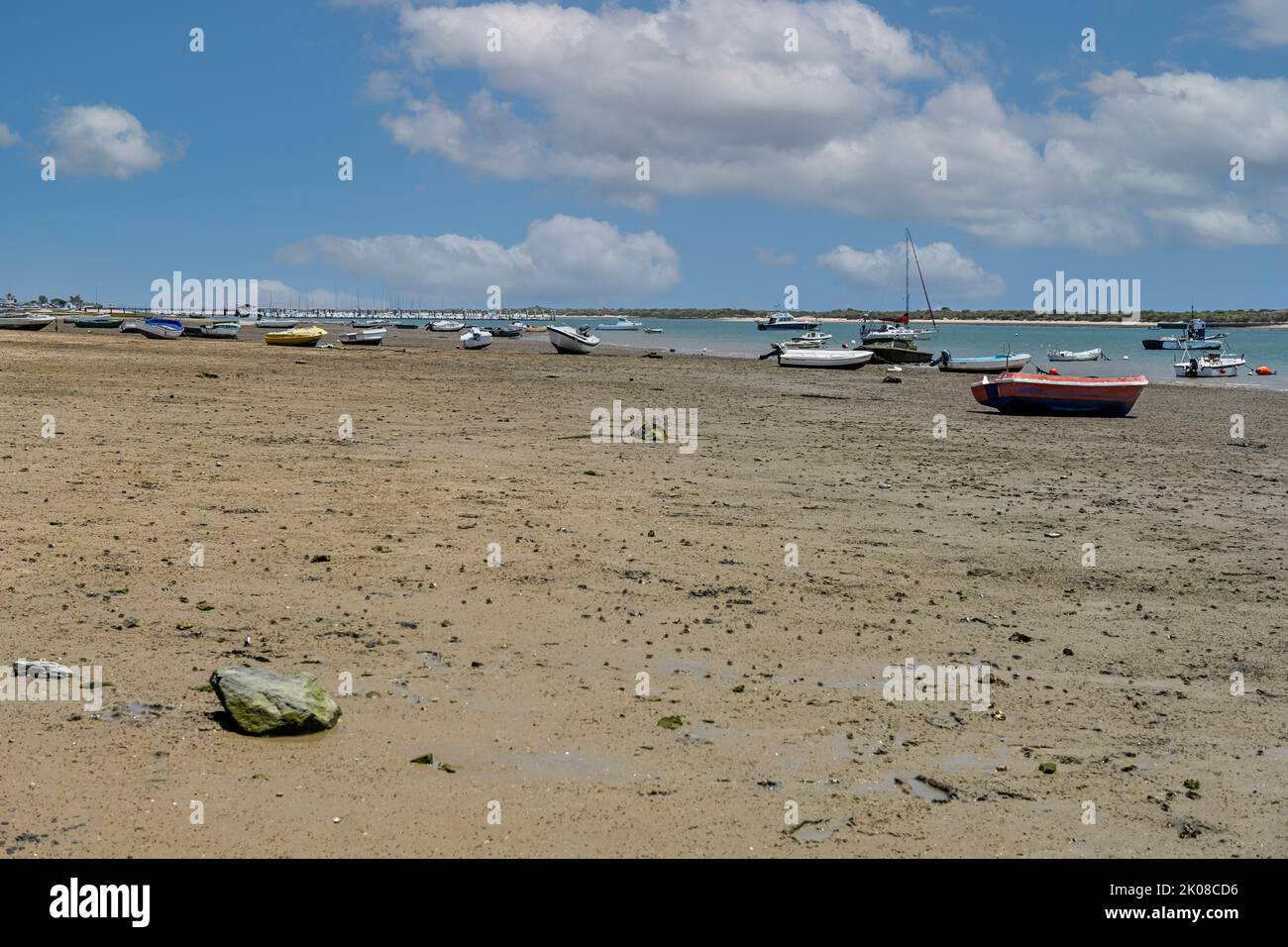 Fishing and pleasure boats anchored on the banks of a river Stock Photo ...