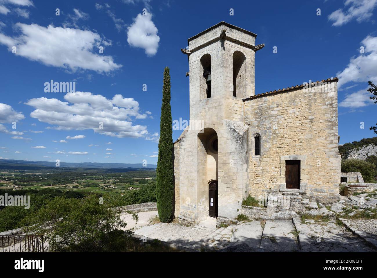 c16th Romanesque Church of Notre Dame Dalidon Oppède le Vieux and view over Calavon Plain Luberon Vaucluse Provence France Stock Photo