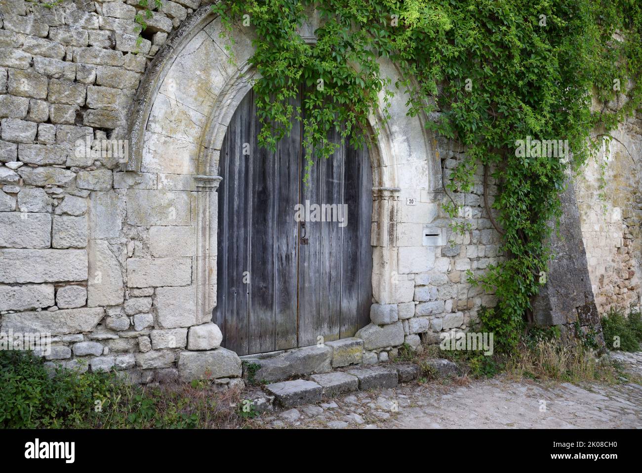 Medieval Style or Old Wooden Door or Doorway Oppede le Vieux Vaucluse Luberon Provence France Stock Photo