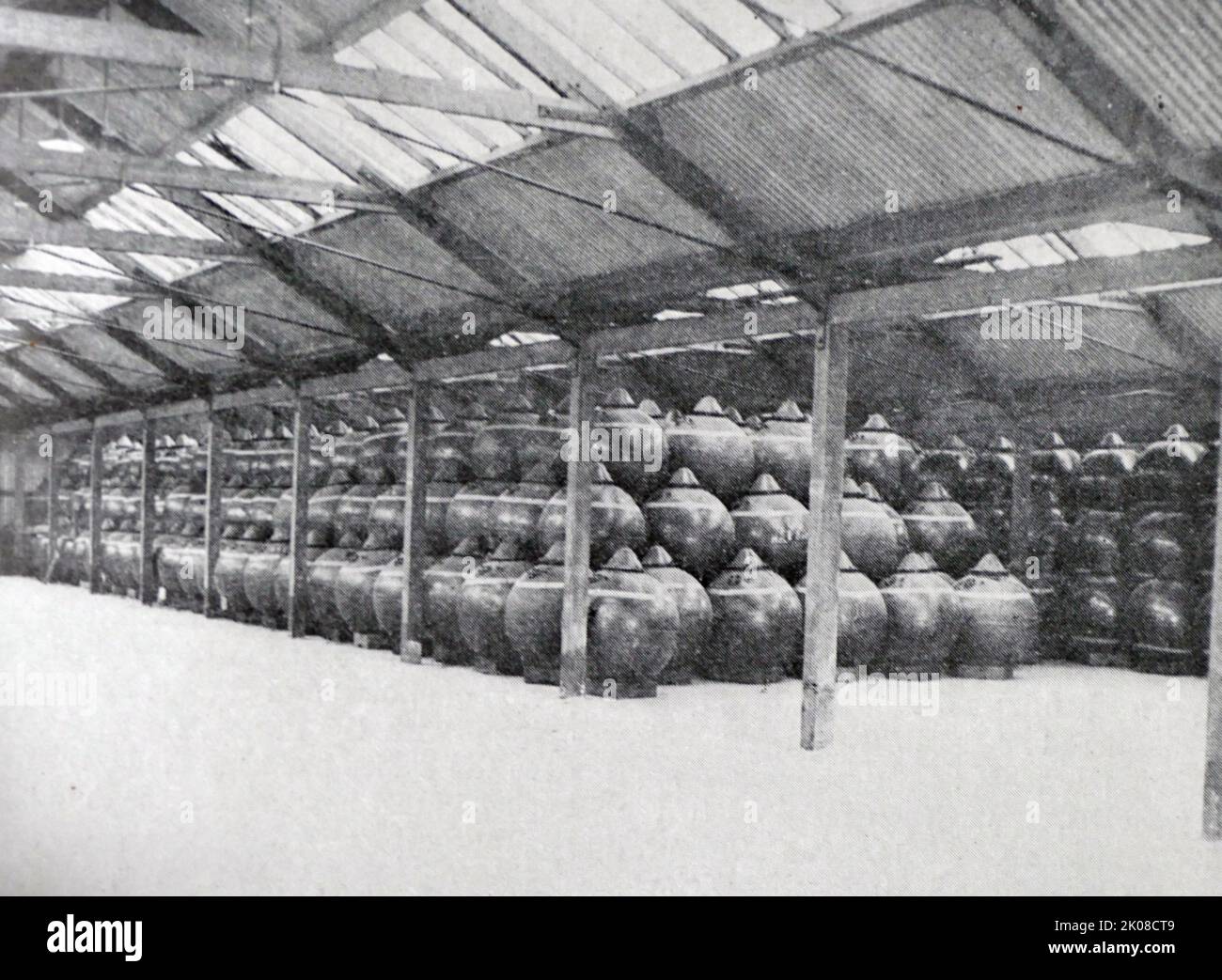 Mines stacked like Dutch cheeses in a mine store during World War I