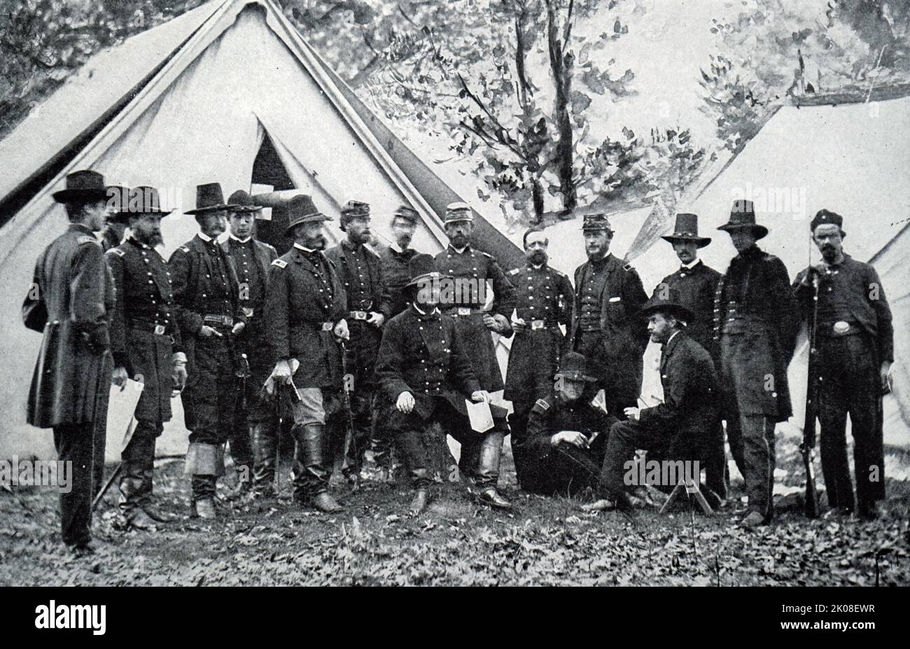 General A. E. Burnside and staff during the American Civil War. Ambrose Everett Burnside (May 23, 1824 - September 13, 1881) was an American army officer and politician who became a senior Union general in the Civil War and three times Governor of Rhode Island, as well as being a successful inventor and industrialist Stock Photo