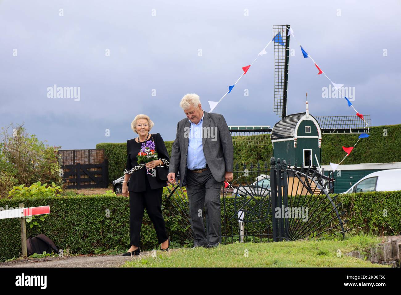 Netherlands, september 9th, 2022 - princess Beatrix is talking with Johan Helmer, charmain windmill council at celebration of the 300th anniversary of Stock Photo
