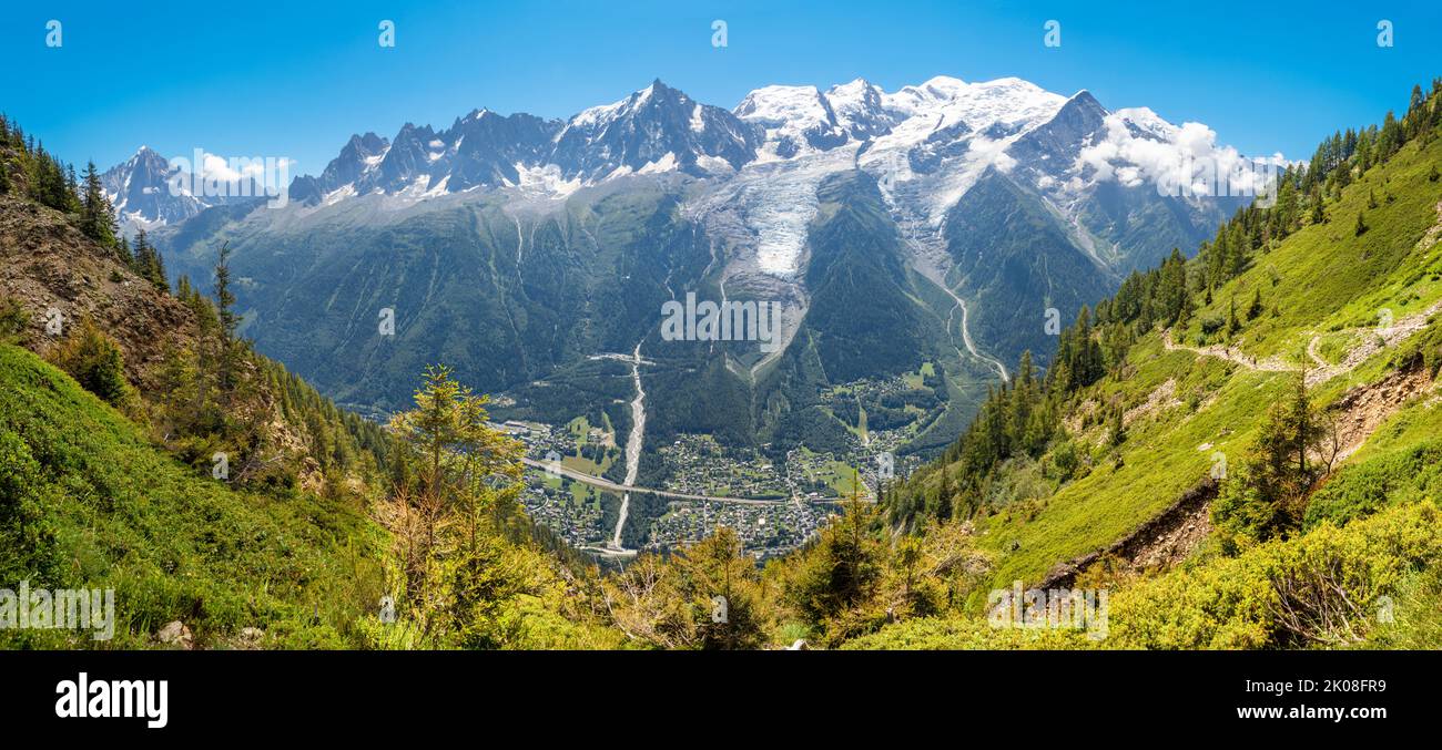 The panorama of Mont Blanc massif Les Aiguilles towers and Aigulle du Vertre peak. Stock Photo