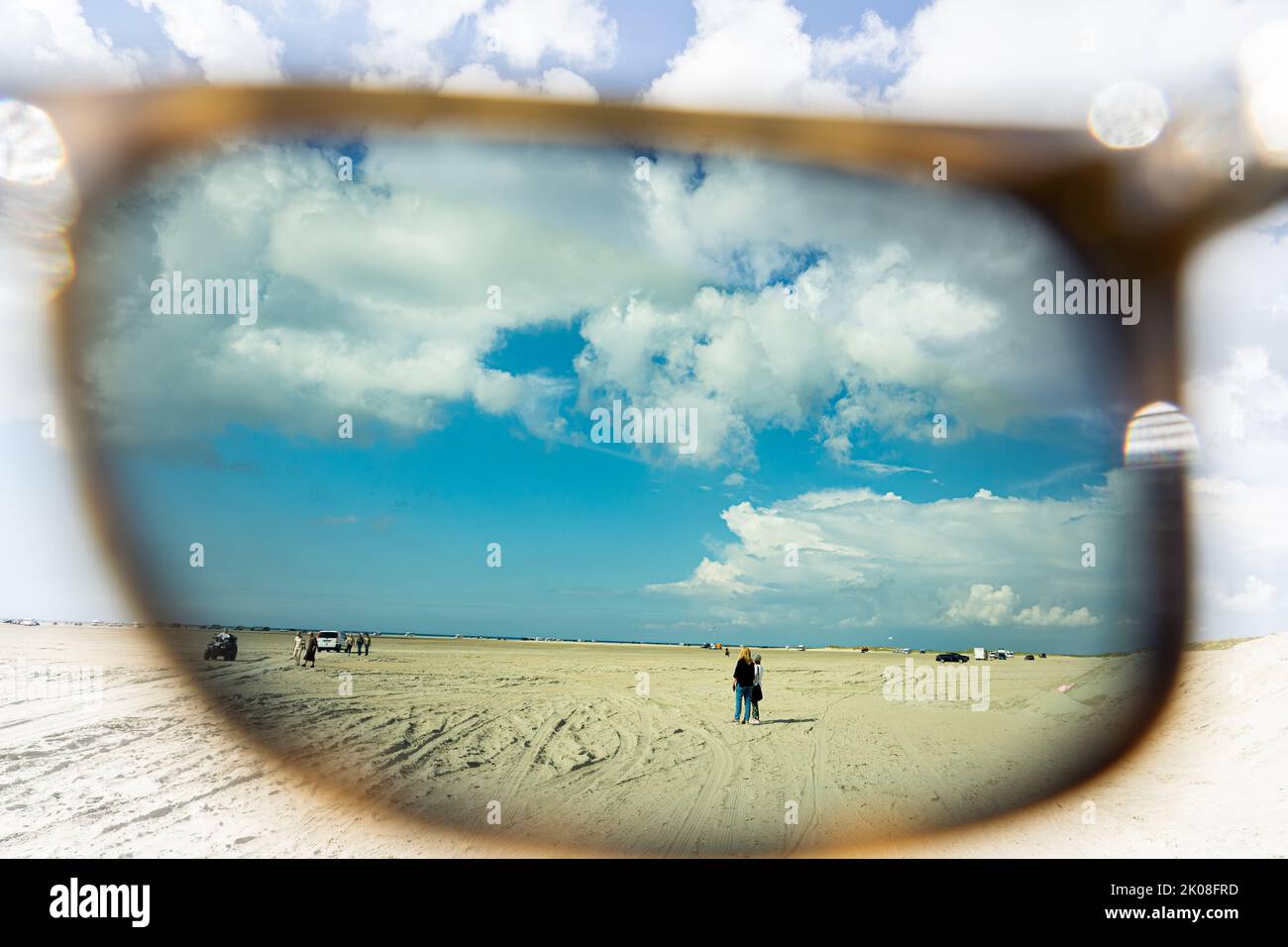 Looking at the beach on Rømø island through polarizing sunglasses Stock Photo