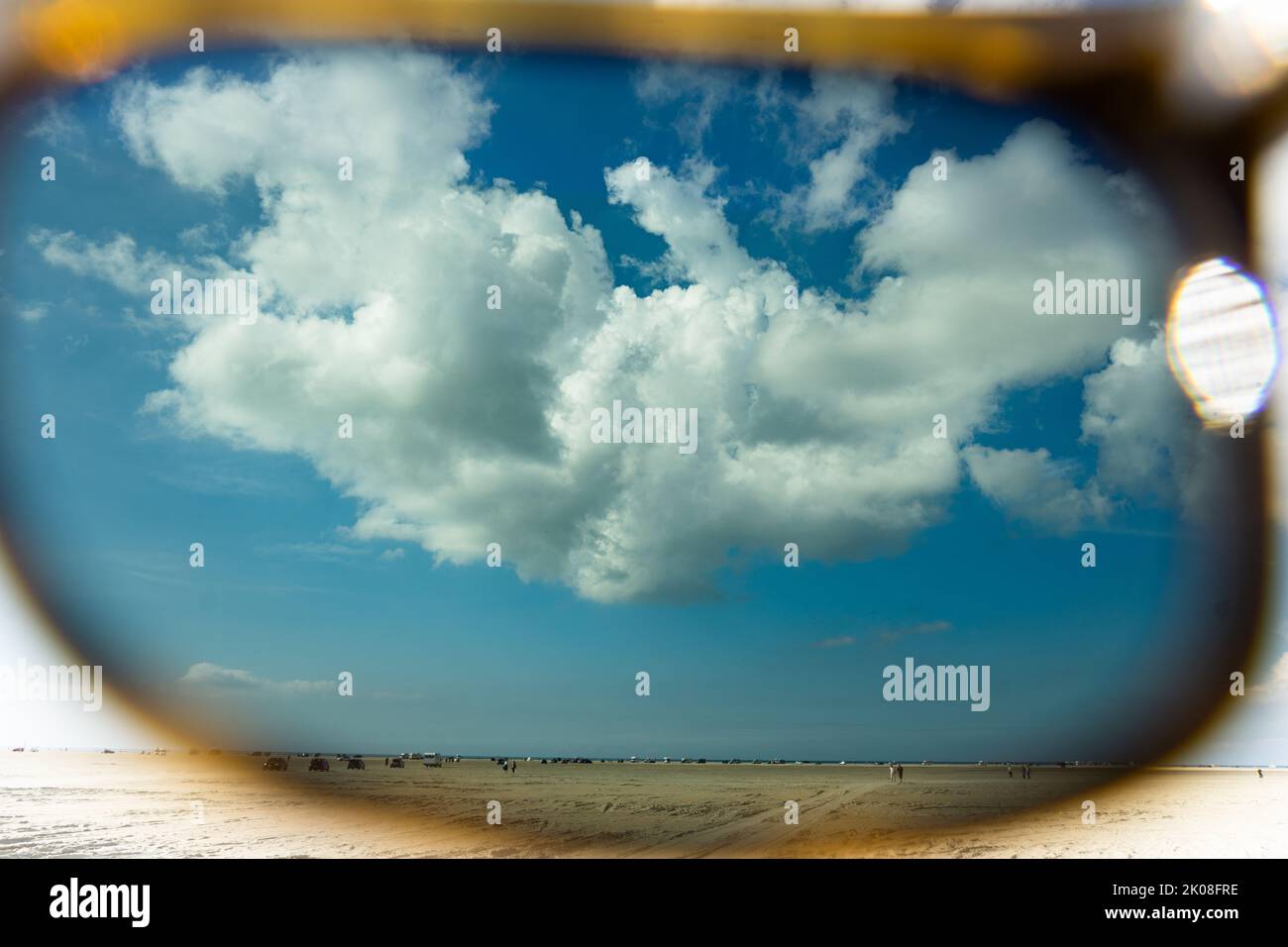 Looking at the beach on Rømø island through polarizing sunglasses Stock Photo