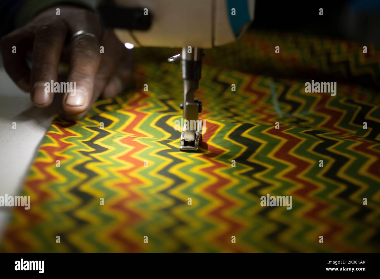 Needle of sewing machine in action Stock Photo