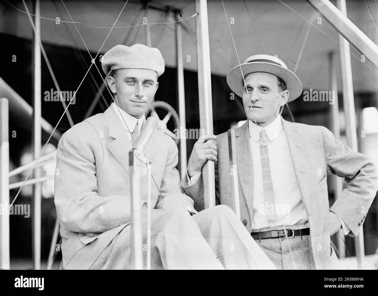 Aviator Harry Atwood, in Plane with Leo Stevens, 1911. [US aviation pineer, engineer and inventor Atwood was chief flight instructor for William Starling Burgess whose Burgess Company built a variety of airplanes, including licensed Wright aircraft. Seen here with balloonist Albert Leo Stevens]. Stock Photo