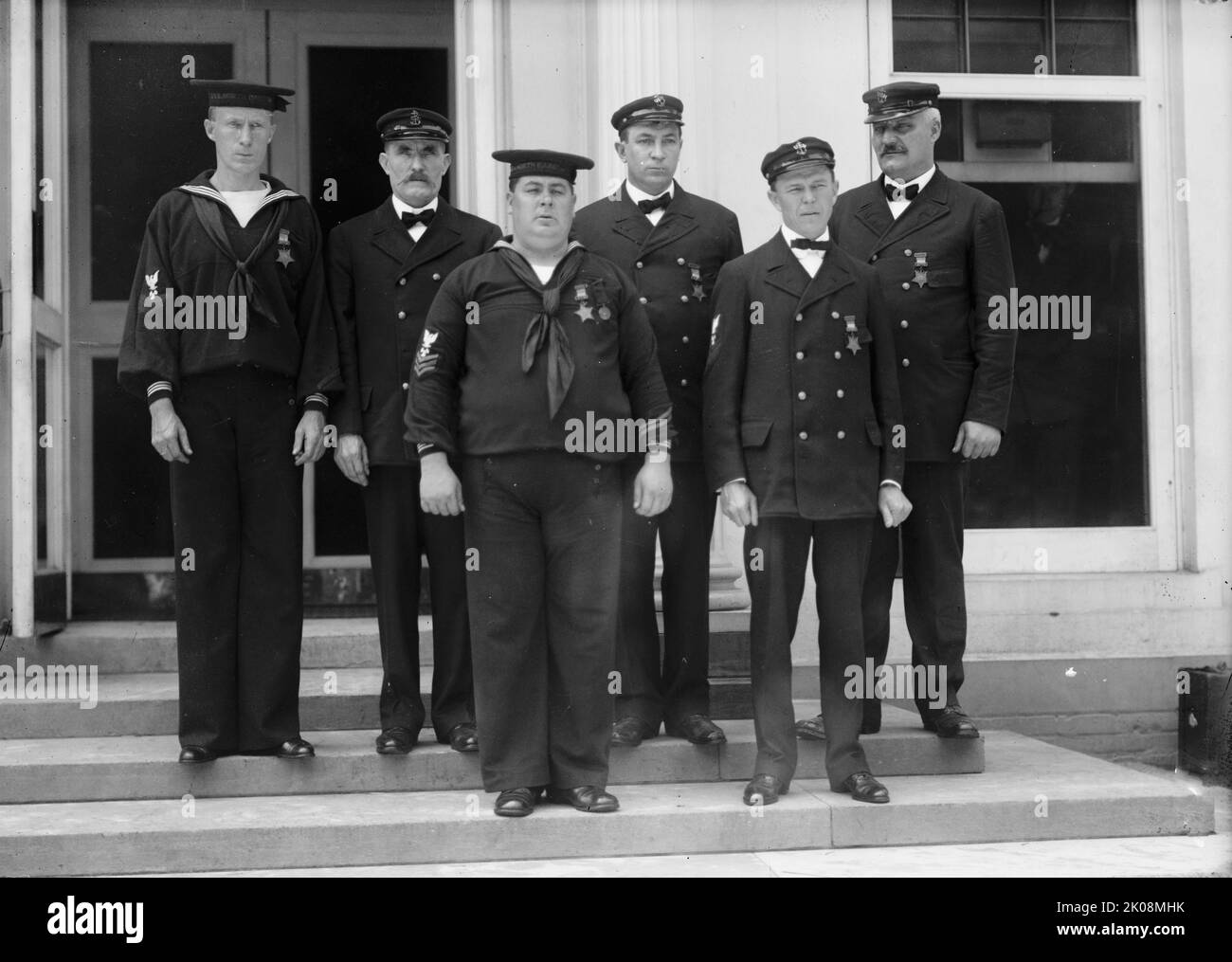 Honor Men of U.S. Navy; Groups, 1911. [Navy personnel, cap bands read: 'U.S.S. North Dakota'. USS North Dakota (BB-29) was a dreadnought battleship launched in November 1908]. Stock Photo