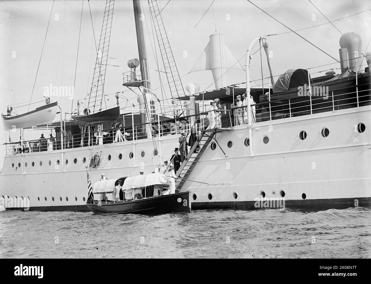 Admiral Togo visits the U.S.S. Mayflower, 1911. [Marshal-Admiral the Marquis Togo Heihachiro was admiral of the fleet in the Imperial Japanese Navy. The USS Mayflower (PY-1)was purchased by the US Navy in 1898, and served as the presidential yacht until 1929]. Stock Photo