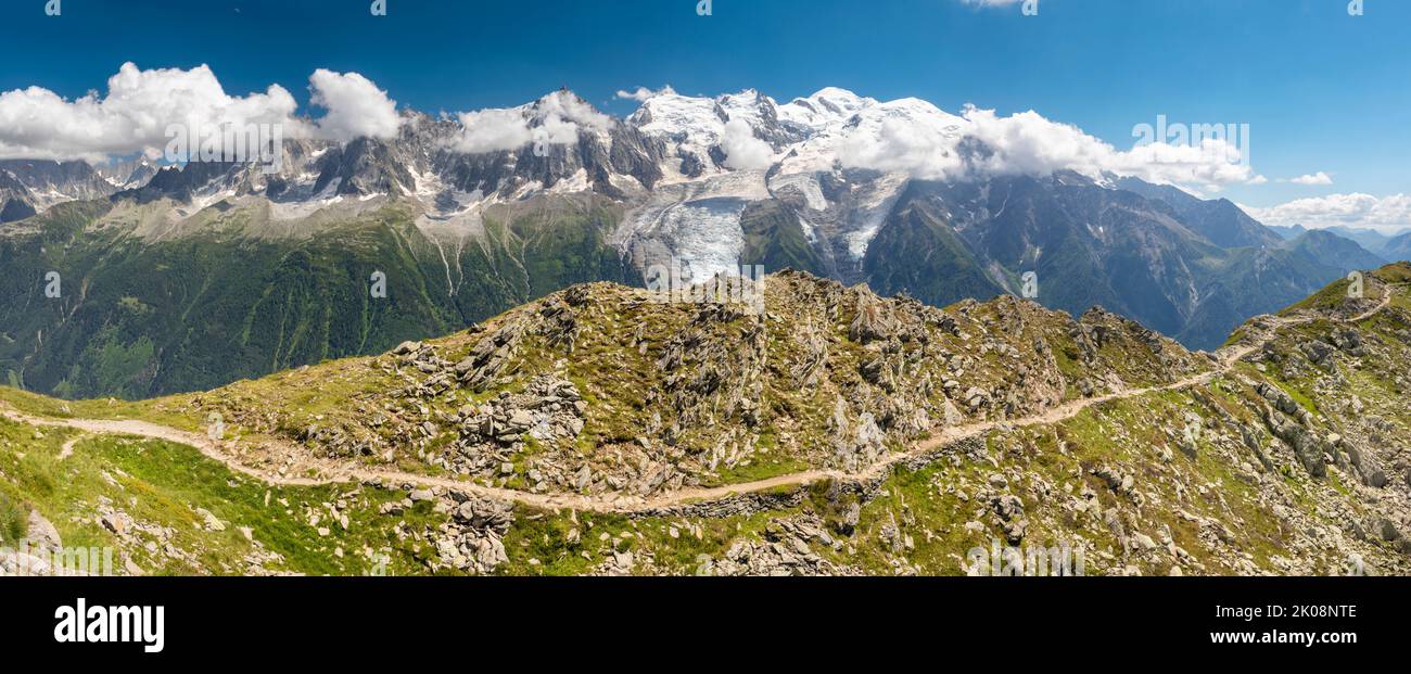 The panorama of Mont Blanc massif and Les Aiguilles towers. Stock Photo