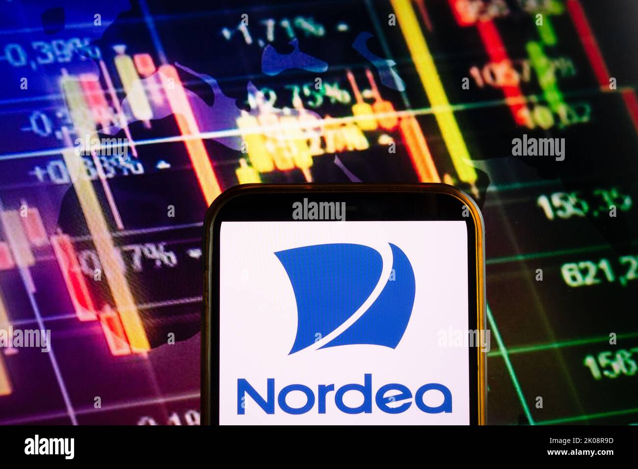 KONSKIE, POLAND - September 10, 2022: Smartphone displaying logo of Nordea Bank company on stock exchange diagram background Stock Photo