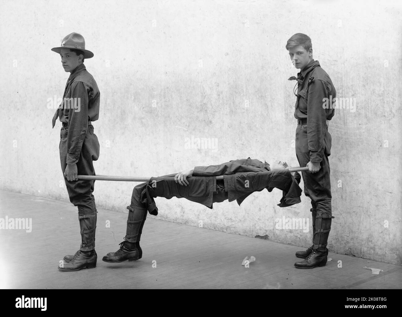 Boy Scouts Training Demonstration, 1912. [Improvised stretcher made