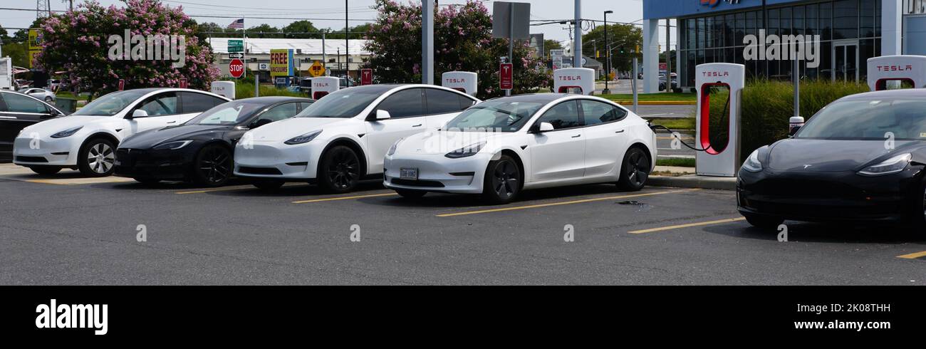 Rehoboth Beach, Delaware, U.S - September 3, 2022 - Tesla cars on the charging station at Wawa's Gas Station Stock Photo