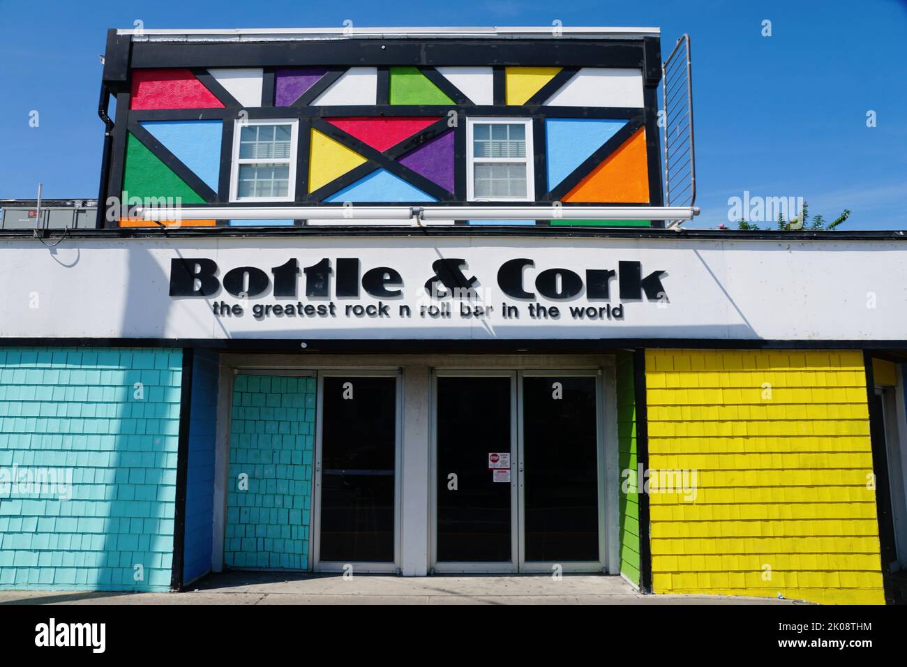Dewey Beach, Delaware, U.S - September 3, 2022 - The colorful building of Bottle & Cork bar on Route 1 in the summer Stock Photo