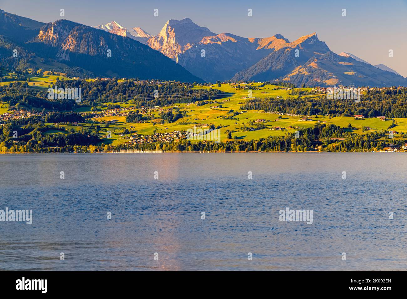 A beautiful summer morning at Lake Thun. The villages Spiez, Faulensee and Krattigen are also a beautiful point of interest in this overwhelming lands Stock Photo