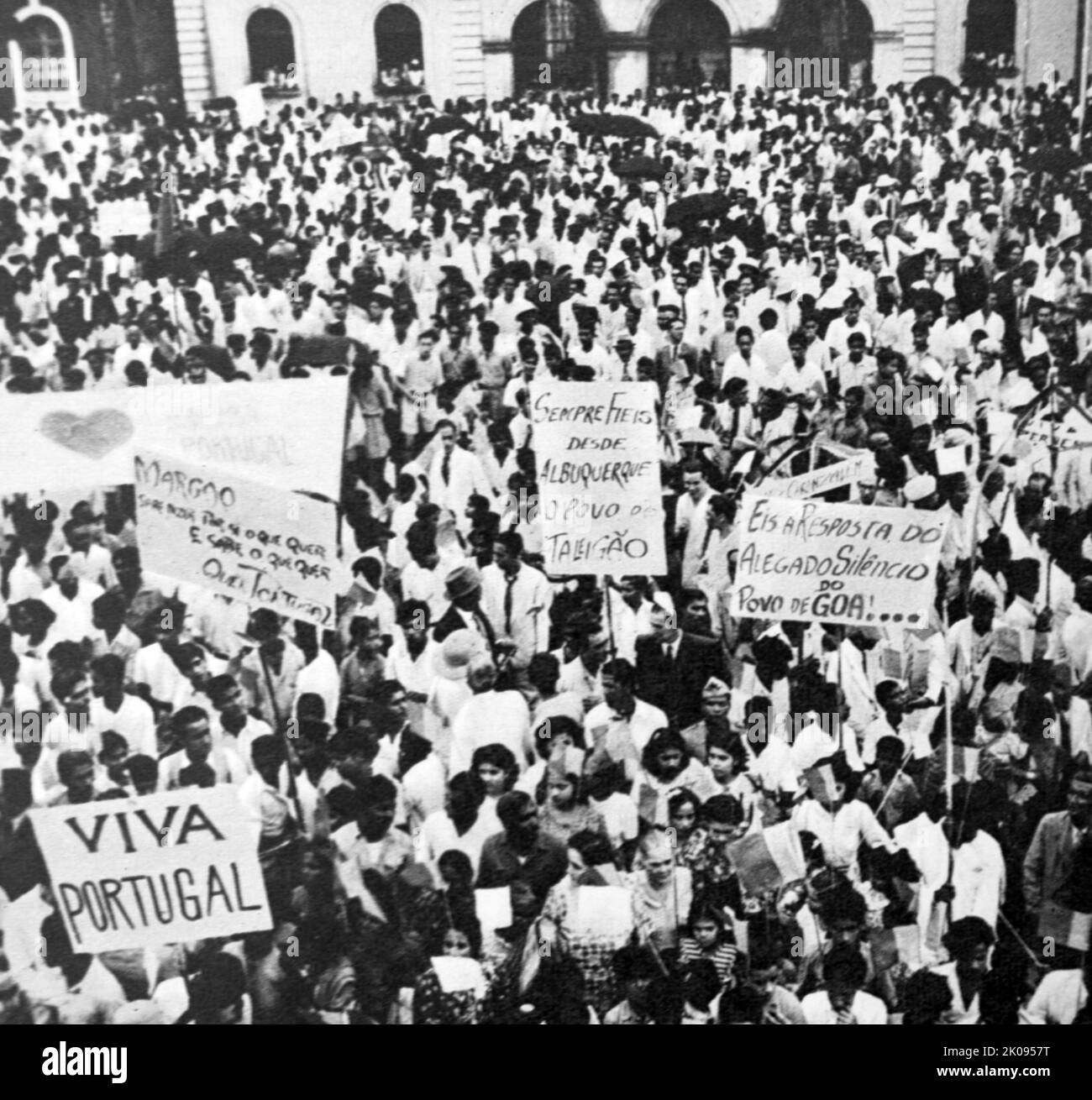 Inhabitants of Nova Goa, in the Portugese colony of Goa, demonstrating their loyalty to Portugal after the country's withdrawal from India. Stock Photo