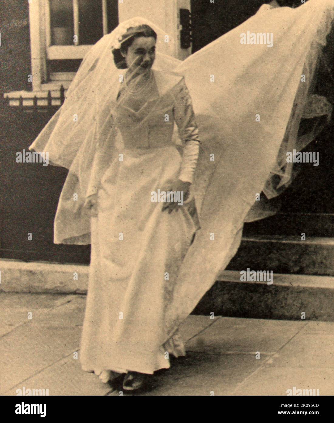 Marion Stein arrived for her wedding to Lord Harewood. On 29 September 1949 at St. Mark's Church, London, Lord Harewood married Marion Stein, a concert pianist and the daughter of the Viennese music publisher Erwin Stein. George Henry Hubert Lascelles, 7th Earl of Harewood, KBE, AM (7 February 1923 - 11 July 2011), styled The Honourable George Lascelles before 1929 and Viscount Lascelles between 1929 and 1947, was a British classical music administrator and author. Illustrated London News. Stock Photo