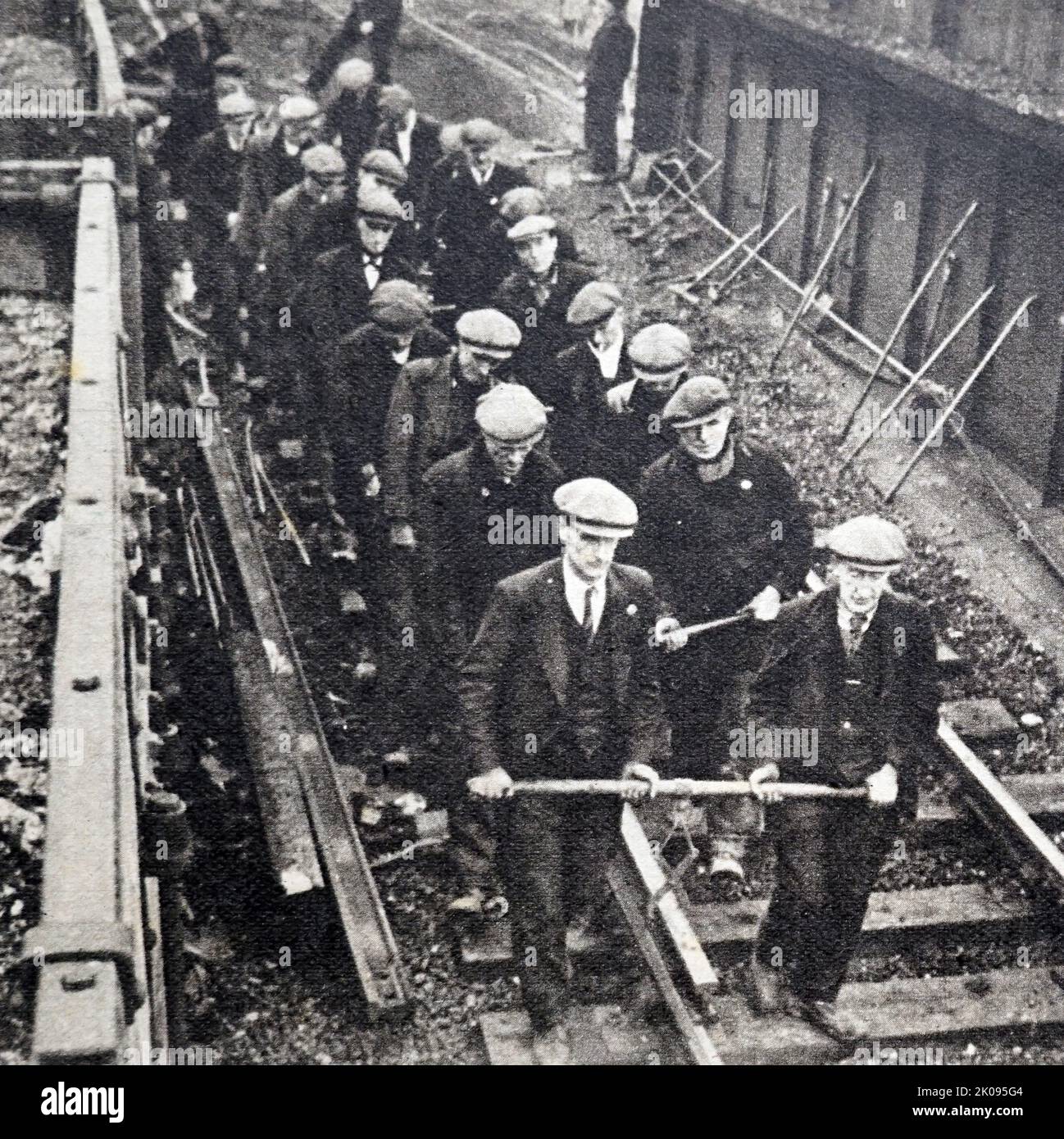 Railway bombing. Repair gangs working on the railway line. Stock Photo