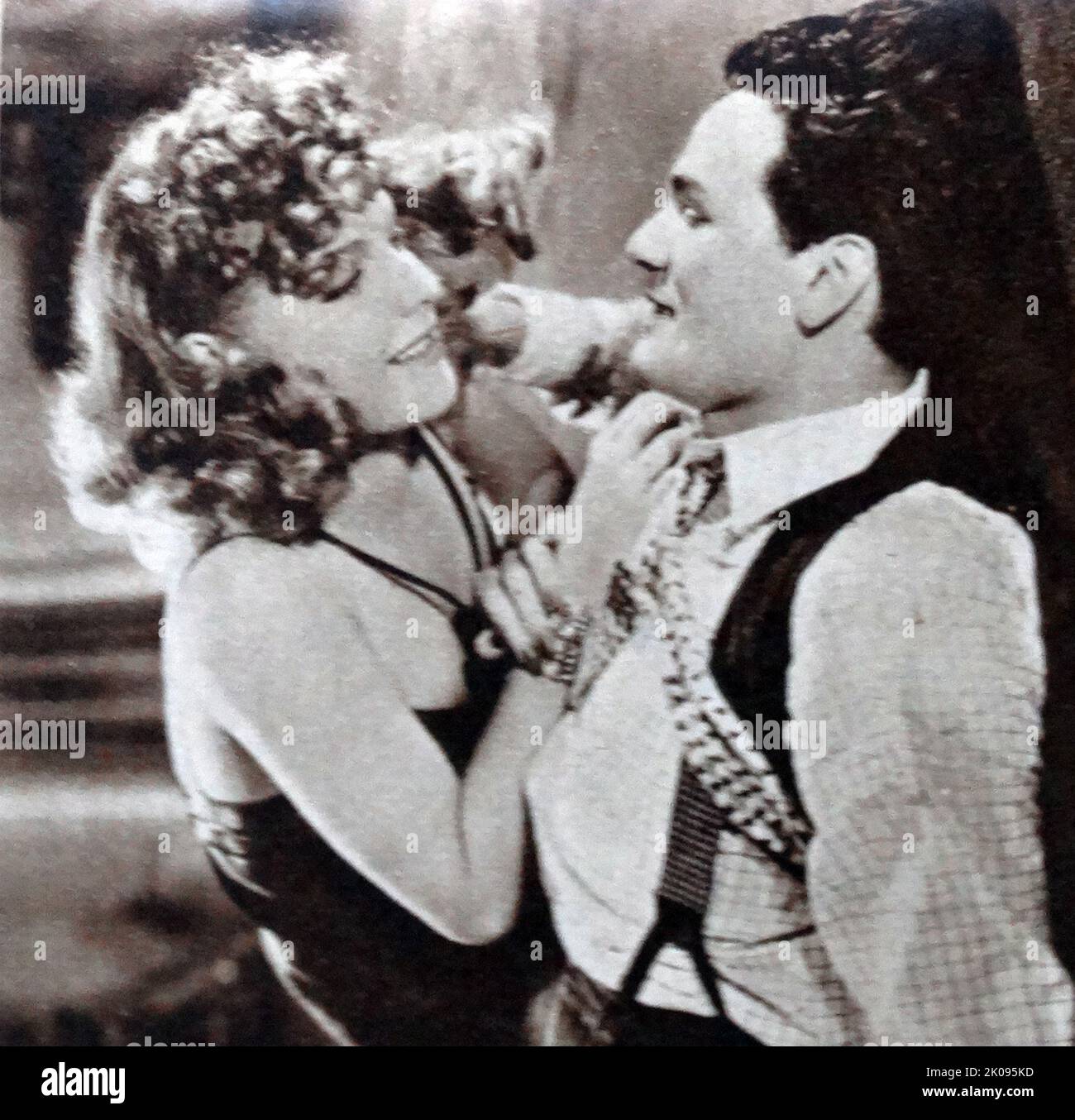 Ann Sheridan and John Gardfield in They Made Me a Criminal, a 1939 American crime drama film. Clara Lou 'Ann' Sheridan (February 21, 1915 - January 21, 1967) was an American actress and singer. John Garfield (born Jacob Julius Garfinkle, March 4, 1913 - May 21, 1952) was an American actor who played brooding, rebellious, working-class characters. Stock Photo