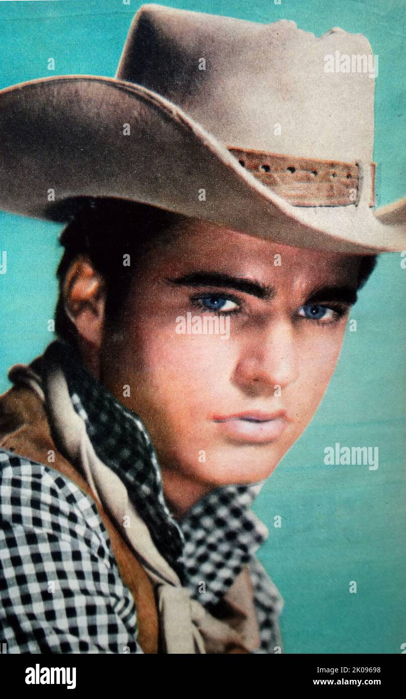 Ricky Nelson. Eric Hilliard Nelson (May 8, 1940 - December 31, 1985), known professionally as Ricky Nelson, was an American singer, pop pioneer, musician, and actor. Stock Photo