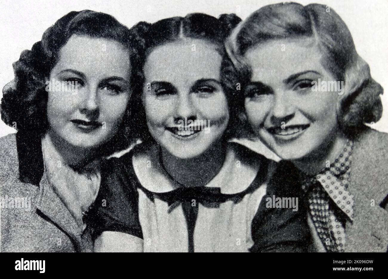 Deanna Durbin, Helen Parrish and Nan Grey in Three Smart Girls, a 1936 American musical comedy film. Edna Mae Durbin (December 4, 1921 - April 17, 2013), known professionally as Deanna Durbin, was a Canadian-born actress and singer who later settled in France. She appeared in musical films in the 1930s and 1940s. Helen Parrish (March 12, 1923 - February 22, 1959) was an American stage and film actress. Nan Grey (born Eschal Loleet Grey Miller, July 25, 1918 - July 25, 1993) was an American film actress. Stock Photo
