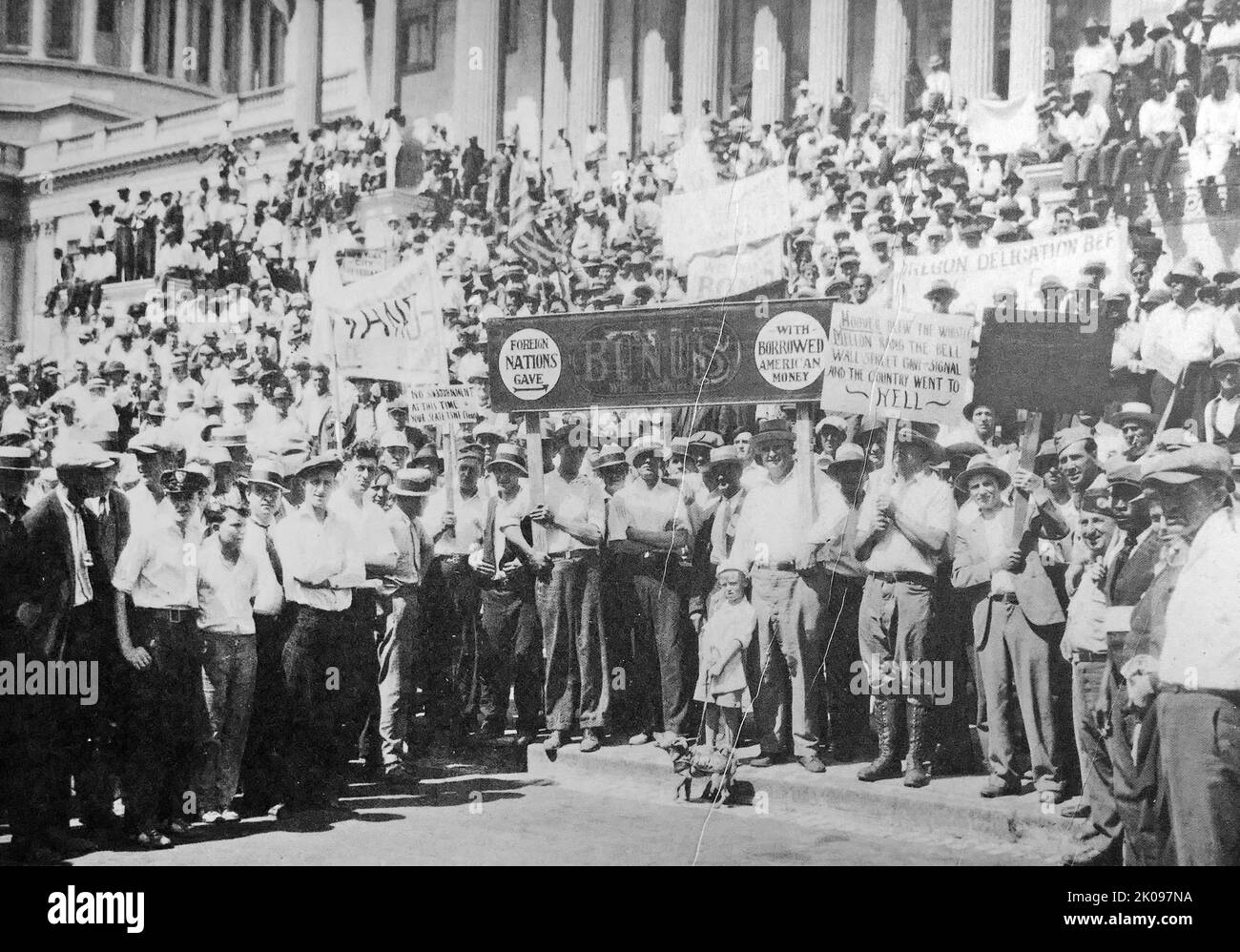 Newspaper report of the Bonus Army, made up of unemployed veterans, protesting on Capitol steps, Washington, USA. Stock Photo