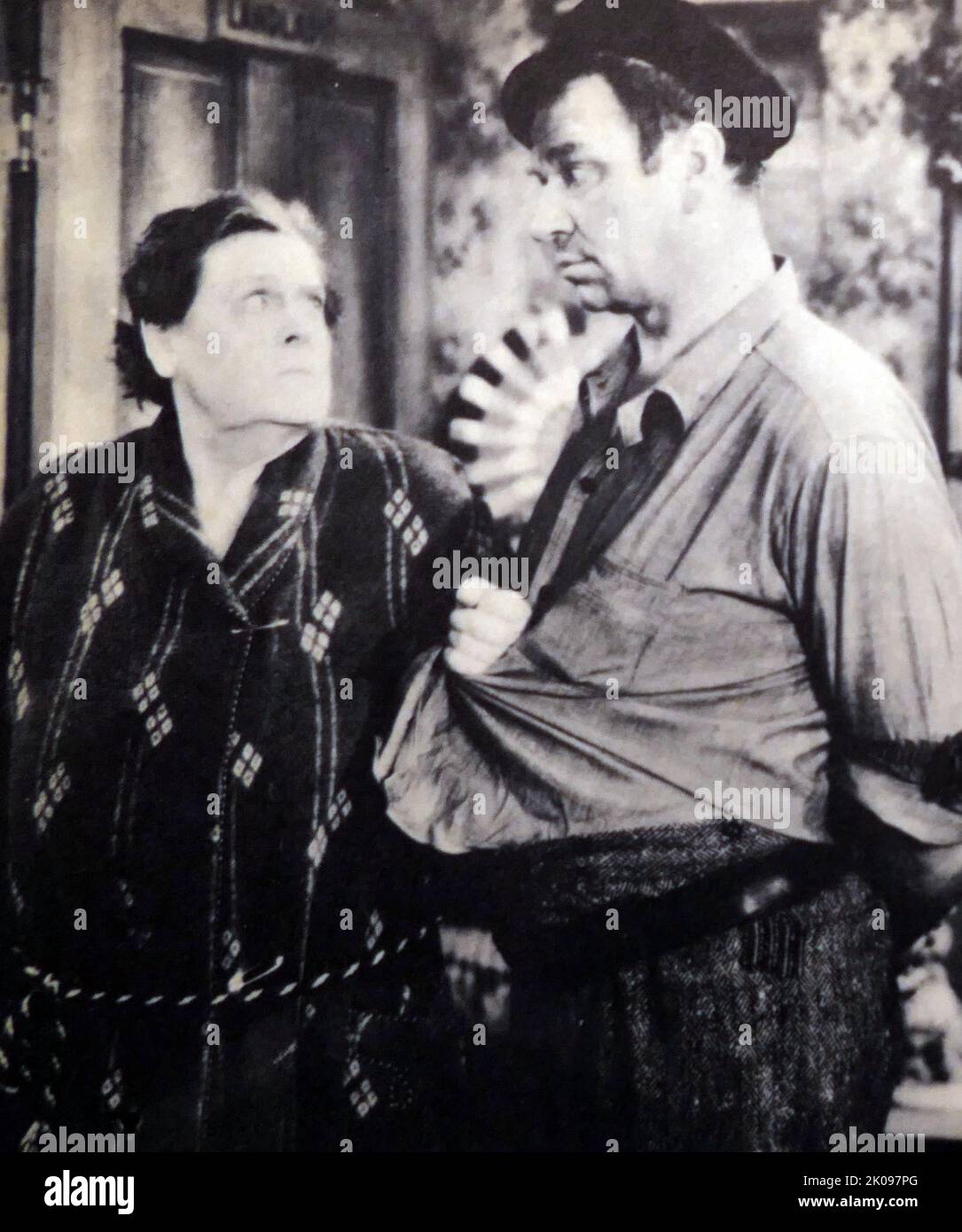 Marie Dressler and Wallace Beery in Min and Bill is a 1930 American Pre-Code comedy-drama film. Marie Dressler (born Leila Marie Koerber, November 9, 1868 - July 28, 1934) was a Canadian stage and screen actress, comedian, and early silent film and Depression-era film star. In 1914, she was in the first full-length film comedy. She won the Academy Award for Best Actress in 1931. Wallace Fitzgerald Beery (April 1, 1885 - April 15, 1949) was an American film and stage actor. Beery appeared in some 250 films during a 36-year career. Stock Photo