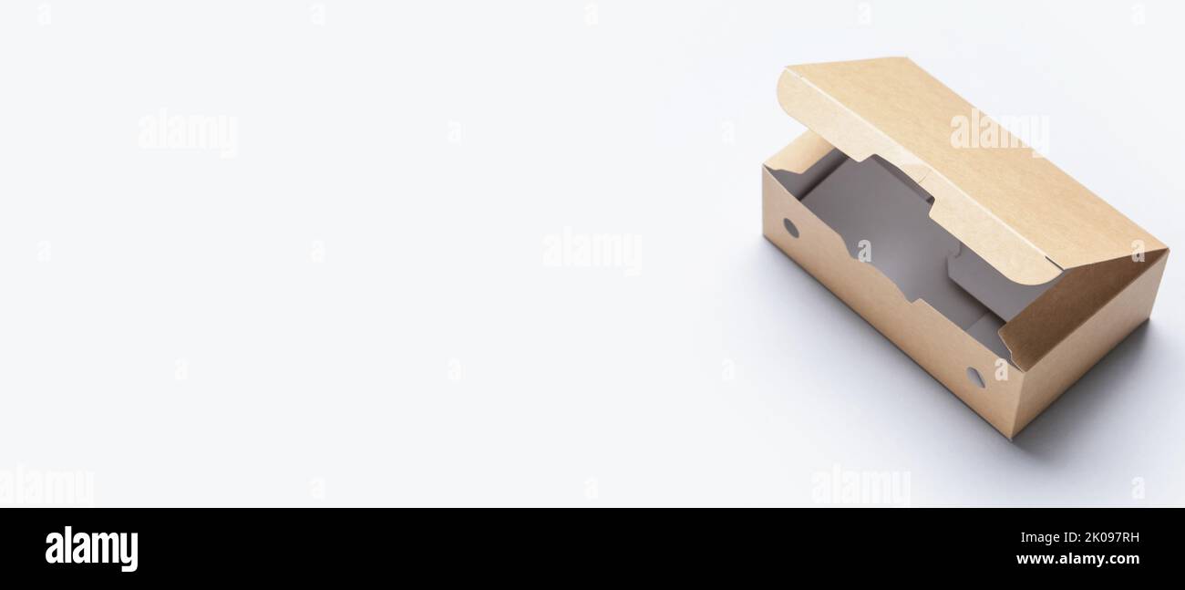 Open cardboard box on white background with space for text Stock Photo