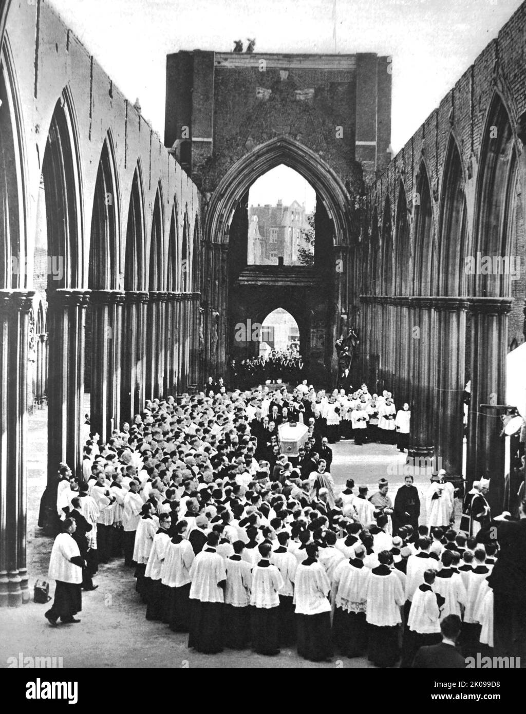 Burial of Archbishop Amigo, sixth bishop of the Roman Catholic diocese of Southwark, in the ruins of Southwark Cathedral. Peter Emmanuel Amigo (26 May 1864, Gibraltar - 1 October 1949) was a Roman Catholic bishop in the Catholic Church in England and Wales. He founded The John Fisher School in 1929. Stock Photo