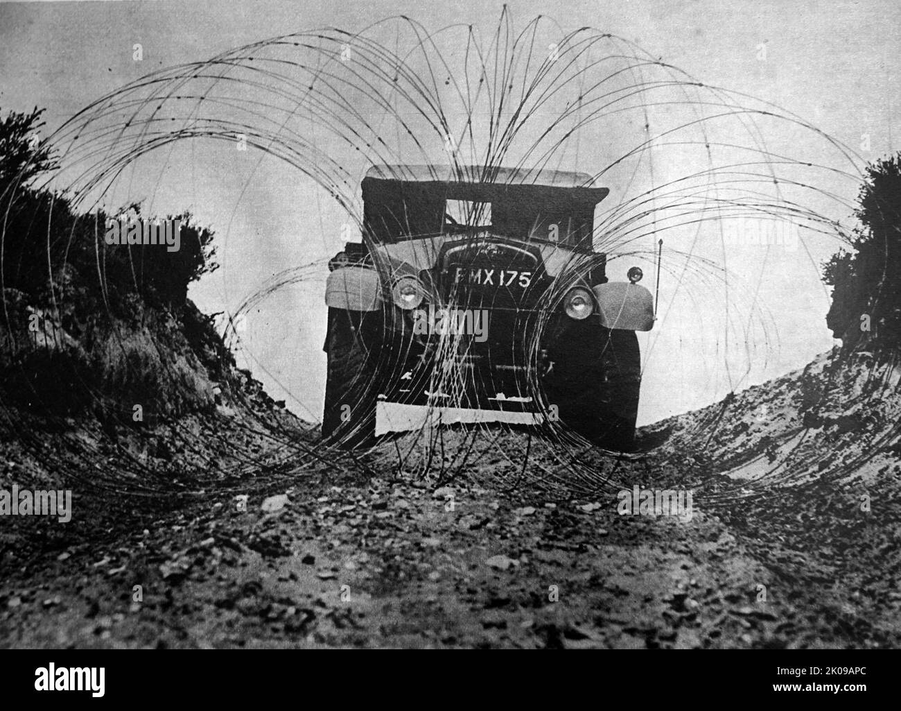 British Army Vehicle Negotiating Wire Barriers During World War II british-army-vehicle-negotiating-wire-barriers-during-world-war-ii